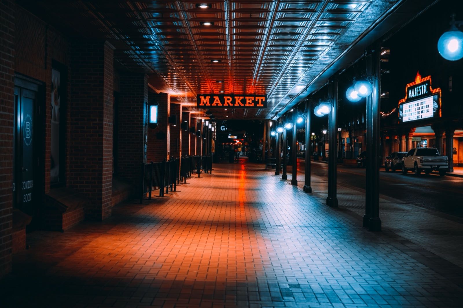 Covered sidewalk and theatre marquee on a downtown San Antonio street