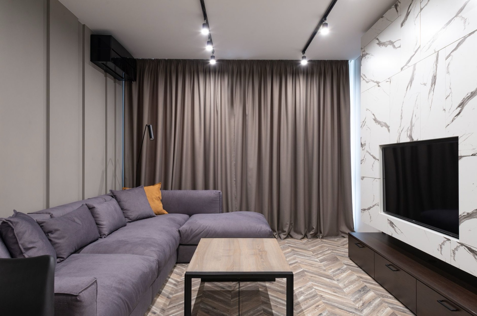 Modern living room with a marble media wall